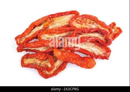 Dried tomatoes heap isolated on white background. Stock Photo