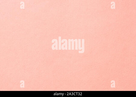 Clean pink paper texture with simple surface. High resolution photo. Color paper, light pink paper. Empty pastel pink paper backgrounds. Stock Photo