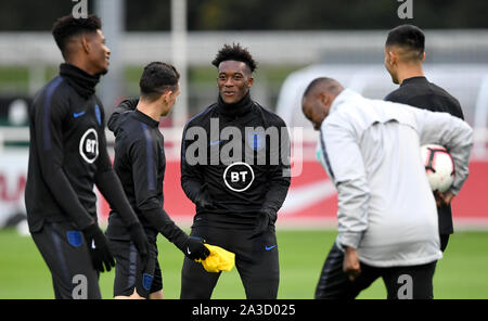 England's Phil Foden (second left) and Callum Hudson-Odoi (centre) during the training session at St George's Park, Burton. Stock Photo