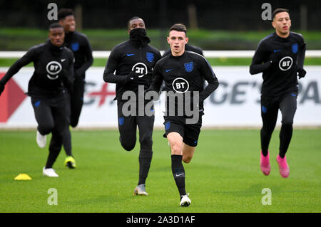 England's Phil Foden (centre) during the training session at St George's Park, Burton. Stock Photo