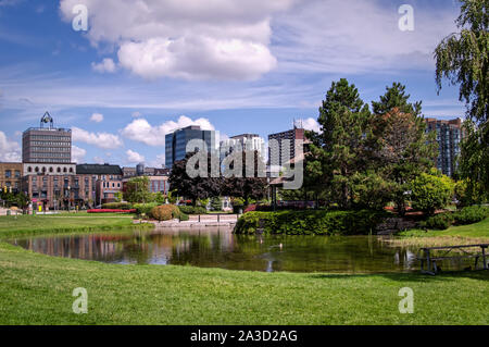 Barrie, Ontario, Canada - 2019 08 25: Summer view on the pond in the Heritage Park in Downtown Barrie, Ontario, Canada. Stock Photo