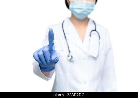 Woman doctor pointing at invisible screen, warning about flu Stock Photo