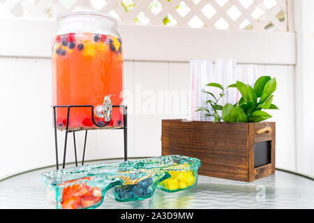 Cute Summer Table Setting with Lemonade and Fruits. Stock Photo