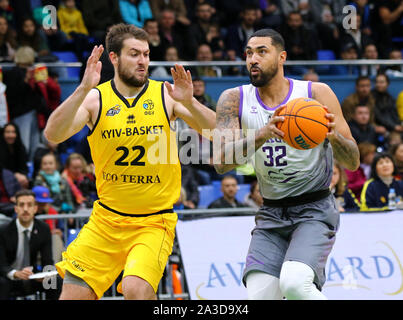 KYIV, UKRAINE - SEPTEMBER 26, 2019: Viacheslav Petrov of BC Kyiv Basket (L) and Augusto Lima of San Pablo Burgos in action during their FIBA Basketball Champions League Qualifiers game Stock Photo