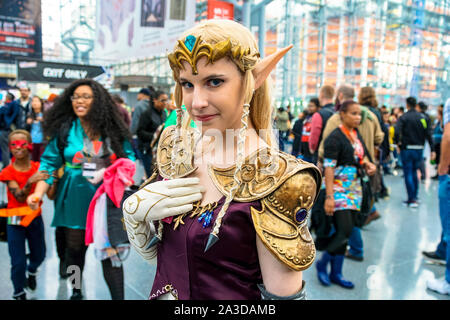 Jacob K. Javits Convention Center, New York New York - October 9, 2016: A beautiful cosplayer dressed as Princess Zelda. Stock Photo