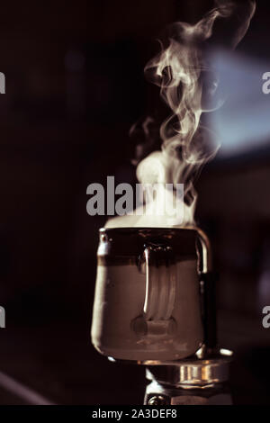 coffee in the morning with water glass, cup of espresso on wood table ...