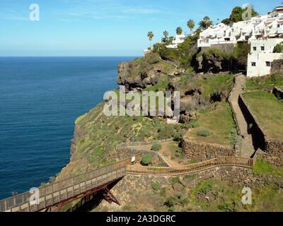 Fantastic green hiking path the Rambla El Castro along the north coast of Canary Island Tenerife in the amount of Los Realejos, with a little bridge m Stock Photo