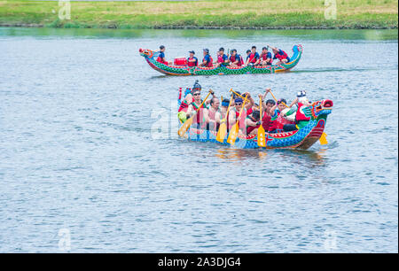 Dragonboat team racing during the 2019 Taipei Dragon Boat festival in Taipei Taiwan Stock Photo