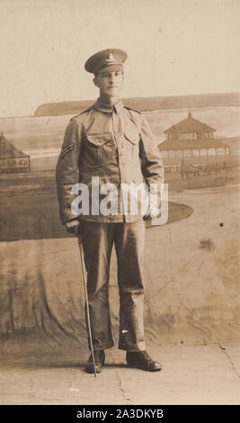 Vintage Early 20th Century Photographic Postcard Showing a British Army Soldier Stock Photo