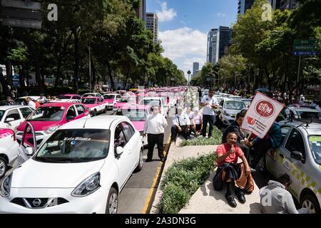 Thousands of taxis are seen parked on the roads around the roads of Mexico City.  Photo credit: Lexie Harrison-Cripps Stock Photo