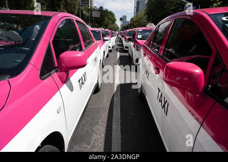 Thousands of taxis are seen parked on the roads around the statue of the Angel of Independence in Mexico City.  Photo credit: Lexie Harrison-Cripps Stock Photo