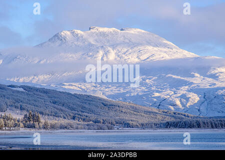 Snow on Fuar Tholl (known locally as Wellingtons Nos) near Achnashellach, Wester Ross, NW Highlands of Scotland, from the jetty in Lochcarron village. Stock Photo