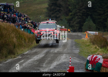 5th October 2019, Wales ; SS13 Sweet Lamb Hafren, Wales Rally GB 2019 Stage 13: Sebastien OGIER & Co Driver Julien INGRASSIA competing in the Citroen C3 WRC for Citroen Total WRT takes flight over the jump prior to the water splash. Credit: Gareth Dalley/News Images Stock Photo