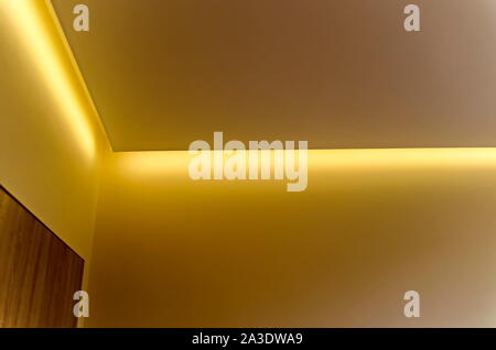 Fragment of a recently painted room with modern LED lighting, Sofia, Bulgaria Stock Photo