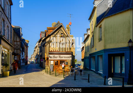 Domfront, France, Feb 2019, exterior of the half timbered building of the restaurant 'Au Bar Normand' in a medieval town of Normandy Stock Photo