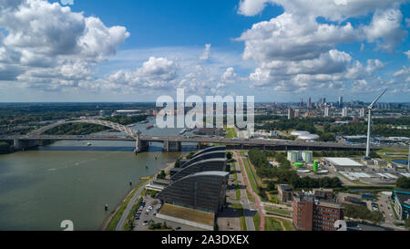 Van Brienenoord Bridge in Rotterdam over the river Nieuwe Maas seen from the north bank on the east side. The two arch bridges, part of the A16 motorw Stock Photo