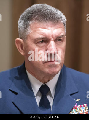 Washington, District of Columbia, USA. 7th Oct, 2019. United States Coast Guard Admiral Karl Leo Schultz, Commandant of the Coast Guard, participates in a briefing with US President Donald J. Trump and senior military leaders in the Cabinet Room of the White House in Washington, DC on Monday, October 7, 2019 Credit: Ron Sachs/CNP/ZUMA Wire/Alamy Live News Stock Photo