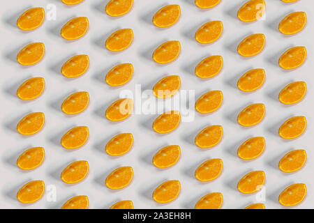 Oranges slides with a shadow on a white background Stock Photo