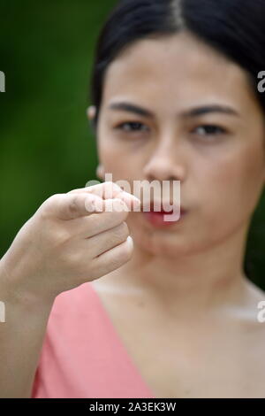 A Mad Beautiful Asian Woman Stock Photo