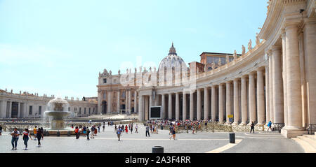 Editorial St. Peter's Square, Vatican City - 17th Jun 2019: General view of St. Peter's square looking towards the basilica with visitors at the site. Stock Photo