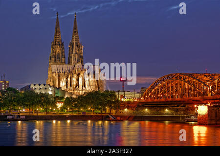 Cologne cathedral and the River Rhine railway bridge, Germany. Stock Photo