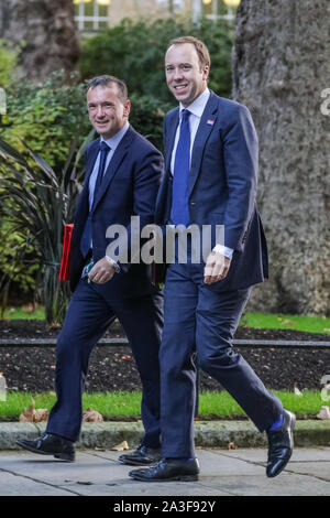 Downing Street, Westminster London, UK, 08 Oct 2019. Alun Cairns, Secretary of State for Wales (left) and Matt Hancock, Secretary of State for Health and Social Care. Ministers attend the weekly government Cabinet Meeting in Downing Street this morning. Credit: Imageplotter/Alamy Live News Stock Photo