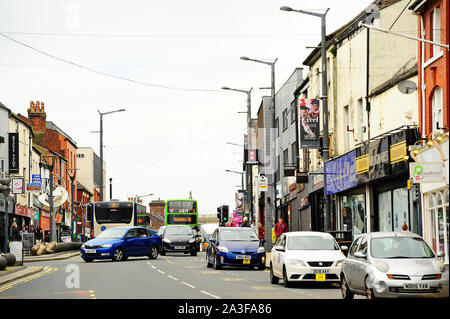 Traffic and shops on Friargate in Preston City centre Stock Photo