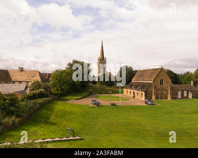 View down to Great Hall of Oakham Cast;e and the impressive  All Saints Church Oakham Rutland East Midlands England UK Stock Photo