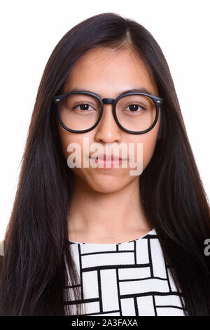 Face of young Asian teenage nerd girl Stock Photo