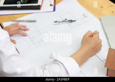 Engineer and Architect concept, Engineer Architects office team working with blueprints Stock Photo