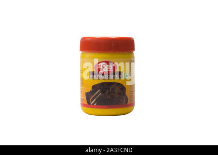 A plastic jar of baking powder isolated on white. Stock Photo