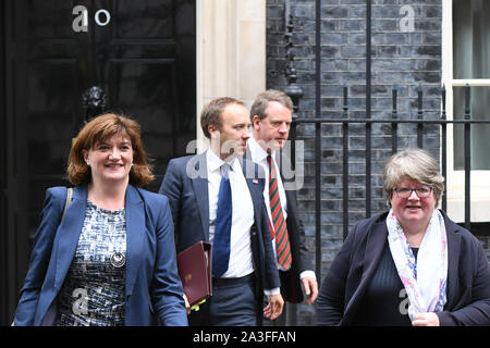 Digital, Culture, Media and Sport Secretary Nicky Morgan (left), Health and Social Care Secretary Matt Hancock (centre left), Secretary of State for Scotland Alister Jack (centre right), Work and Pensions Secretary Therese Coffey (right) leave 10 Downing Street, London, after a Cabinet meeting. Stock Photo