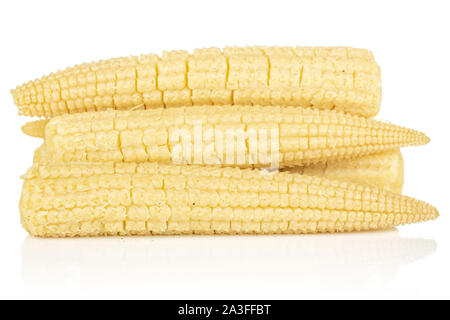 Lot of whole baby yellow corn isolated on white background Stock Photo