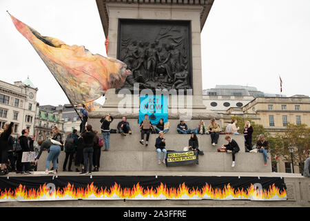 London, UK. 7th October 2019. Extinction Rebellion protesters seen on Trafalgar Square at a two week long protest in London. Credit: Joe Kuis / Alamy News
