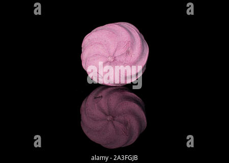 One whole rose fresh pastel zefir isolated on black glass Stock Photo