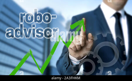 robo advisor concept is shown by businessman. Stock Photo