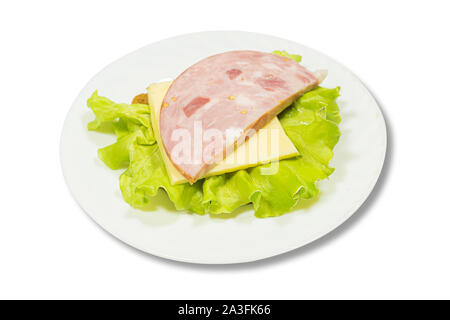 Tasty sandwich. slices of fresh bread with dried pork ham, green salad leaves on white plate. isolated on white. Stock Photo