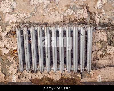 Old heating after water damage Stock Photo