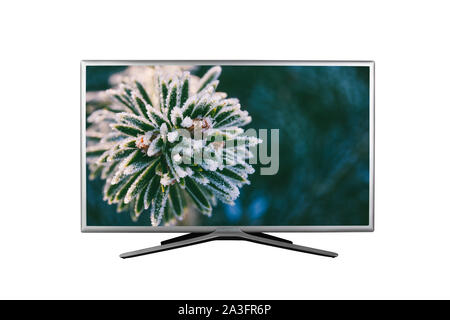 4K monitor or TV with a macro image of a Christmas tree branch covered with frost isolated on white background Stock Photo