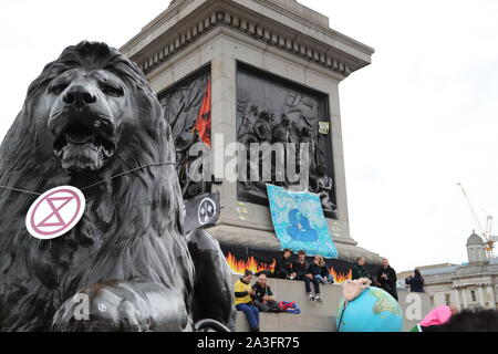 London, UK. 8th Oct, 2019. The Extinction Rebellion movement stages worldwide protests. Demonstrators gather in Westminster to highlight the dangers of climate change to mankind and the environment. Credit: Uwe Deffner/Alamy Live News Stock Photo