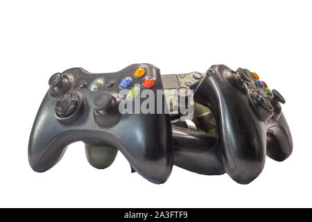 A bunch of console controllers isolated on white Stock Photo