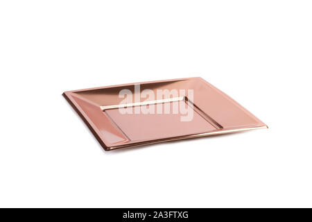 A square copper colored plastic plate Stock Photo