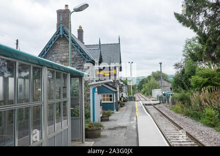 Train,Train station,rail,railway,Caersws,is,a,village,on,banks,of,River Severn,in,the,Welsh,county,of,Powys,Wales,UK,Transport for Wales, Stock Photo