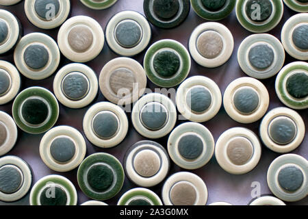 green sewing buttons on white. Stock Photo