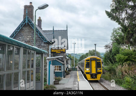 Transport for Wales,Train,platform,Train station,rail,railway,Caersws,is,a,village,on,banks,of,River Severn,in,the,Welsh,county,of,Powys,Wales,UK, Stock Photo