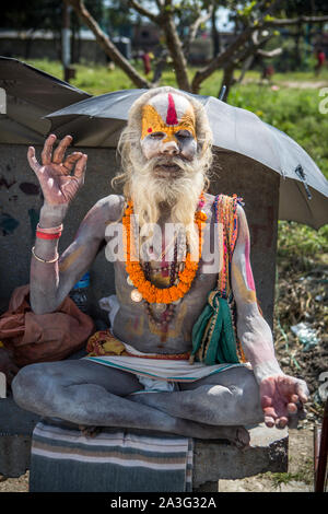 A sadhu, a Hindu holy man, at Pashupatinath Temple in Kathmandu, Nepal Stock Photo