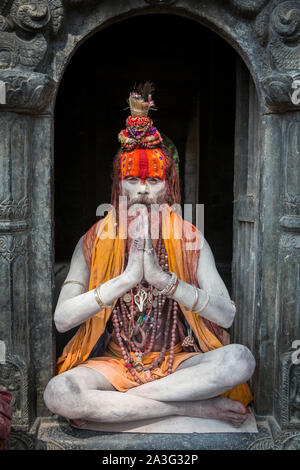 A sadhu, a Hindu holy man, at Pashupatinath Temple in Kathmandu, Nepal Stock Photo