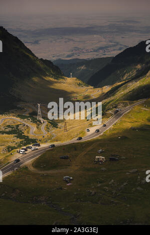 Spectacular panoramic view - mountain road and clouds, Romania- Transfagarasan pass crossing Carpathian mountains in summer Stock Photo