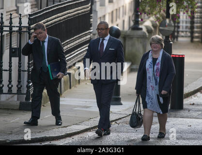 Downing Street, London, UK. 8th October 2019. Government Ministers arrive in Downing Street for weekly cabinet meeting. Left to right: Robert Buckland; James Cleverley; Thérèse Coffey. Credit: Malcolm Park/Alamy Live News. Stock Photo