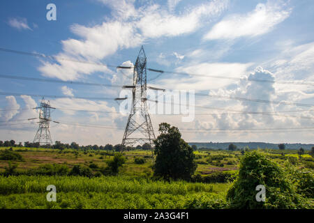 high voltage post.High-voltage tower blue sky white clouds Stock Photo